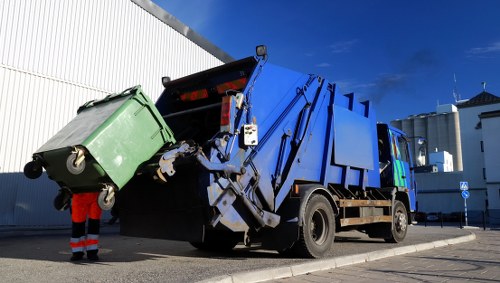 Professionals clearing a garage space in Kentish Town